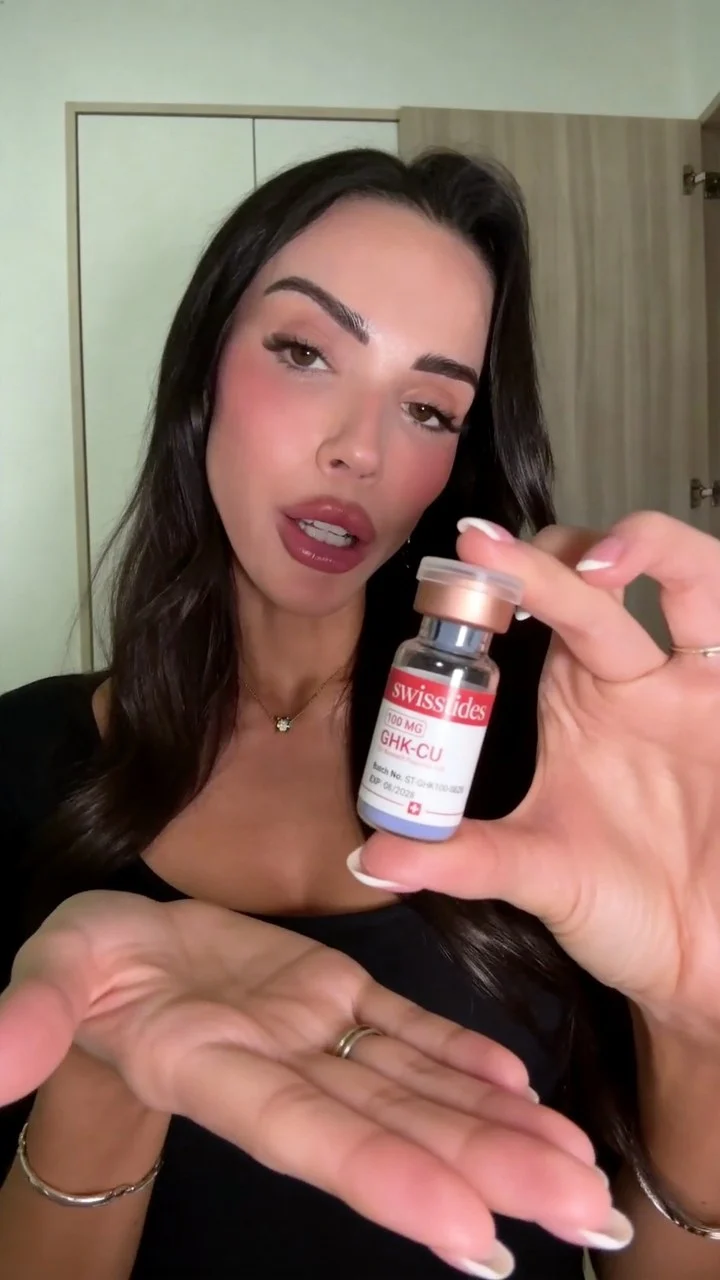 A customer showing her Swiss Tides vial